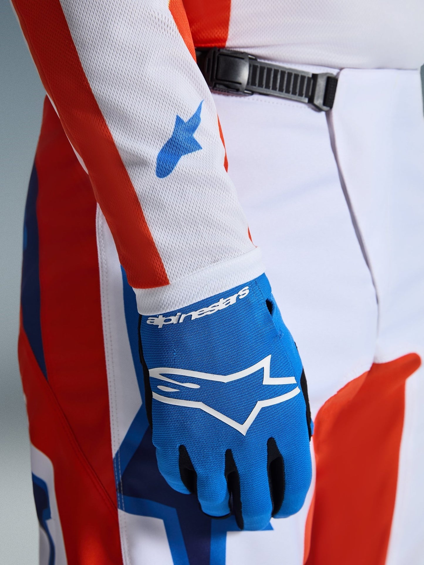 Alpinestars Fluid Grid ergonomische Motocross-Hose in Orange und UCLA Blau - MxProStoreParts