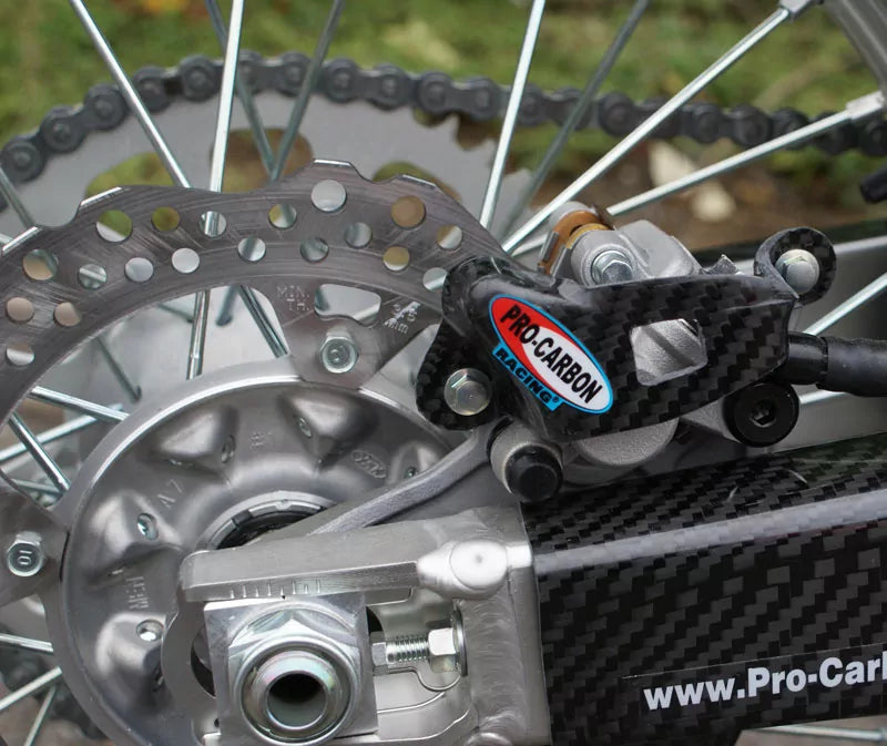 Pro Carbon achter remklauw beschermer Honda CR/CRF 125/250/450 2002-2023