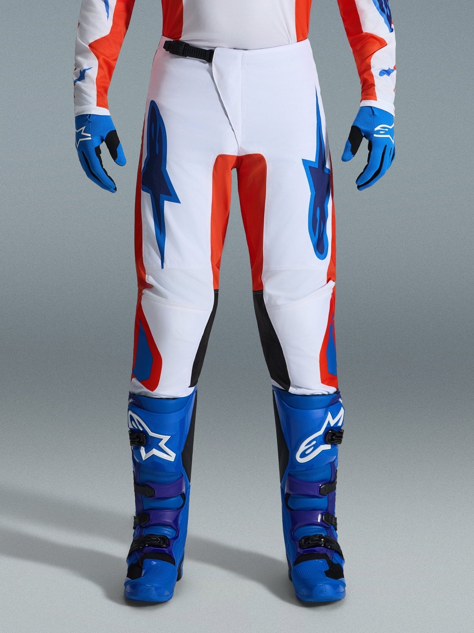 Alpinestars Fluid Grid ergonomische Motocross-Hose in Orange und UCLA Blau - MxProStoreParts