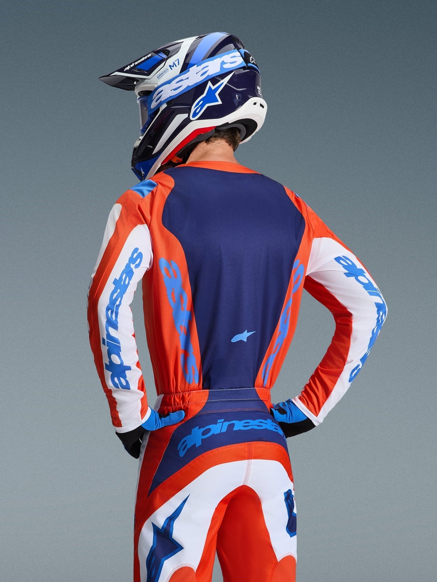 Alpinestars Fluid Grid Trikot 2026 Orange UCLA-Blau - MxProStoreParts