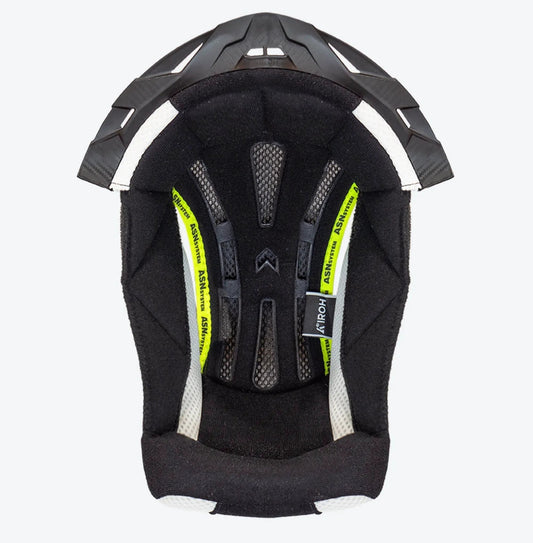 Airoh Aviator Ace 2 crown padding in black; interior view showing cushioned padding and neon-yellow ASNSYSTEM straps.