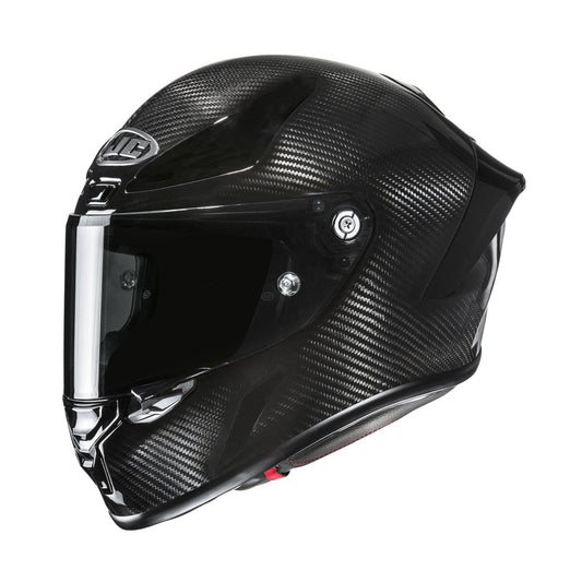 HJC RPHA 1 Carbon Solid full-face motorcycle helmet with black carbon fiber shell and clear visor
