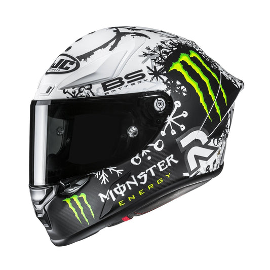 HJC RPHA 1 V2 Carbon Snow Diablo helmet with white/black graphics and neon Monster Energy logo.