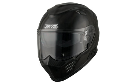 SIMPSON Venom 06 carbon full-face motorcycle helmet with clear visor; brand logo visible.
