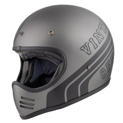 Premier MX BTR 17 BM helmet in matte gray with black trim and striped side graphics