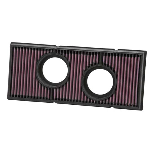 K&N air filter, 990 Adventure rectangular filter with purple pleated media and two round inlet openings.